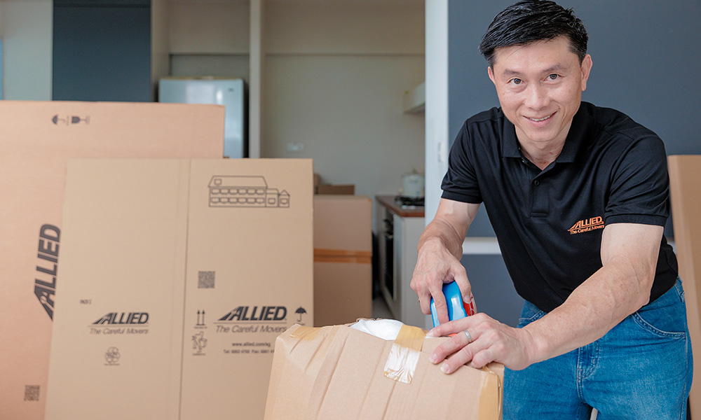 Mover packing a chair for customer